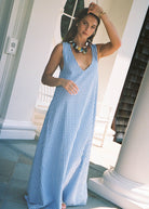 What to wear in Nantucket — light blue gingham maxi dress coastal travel outfit, Puka The Label