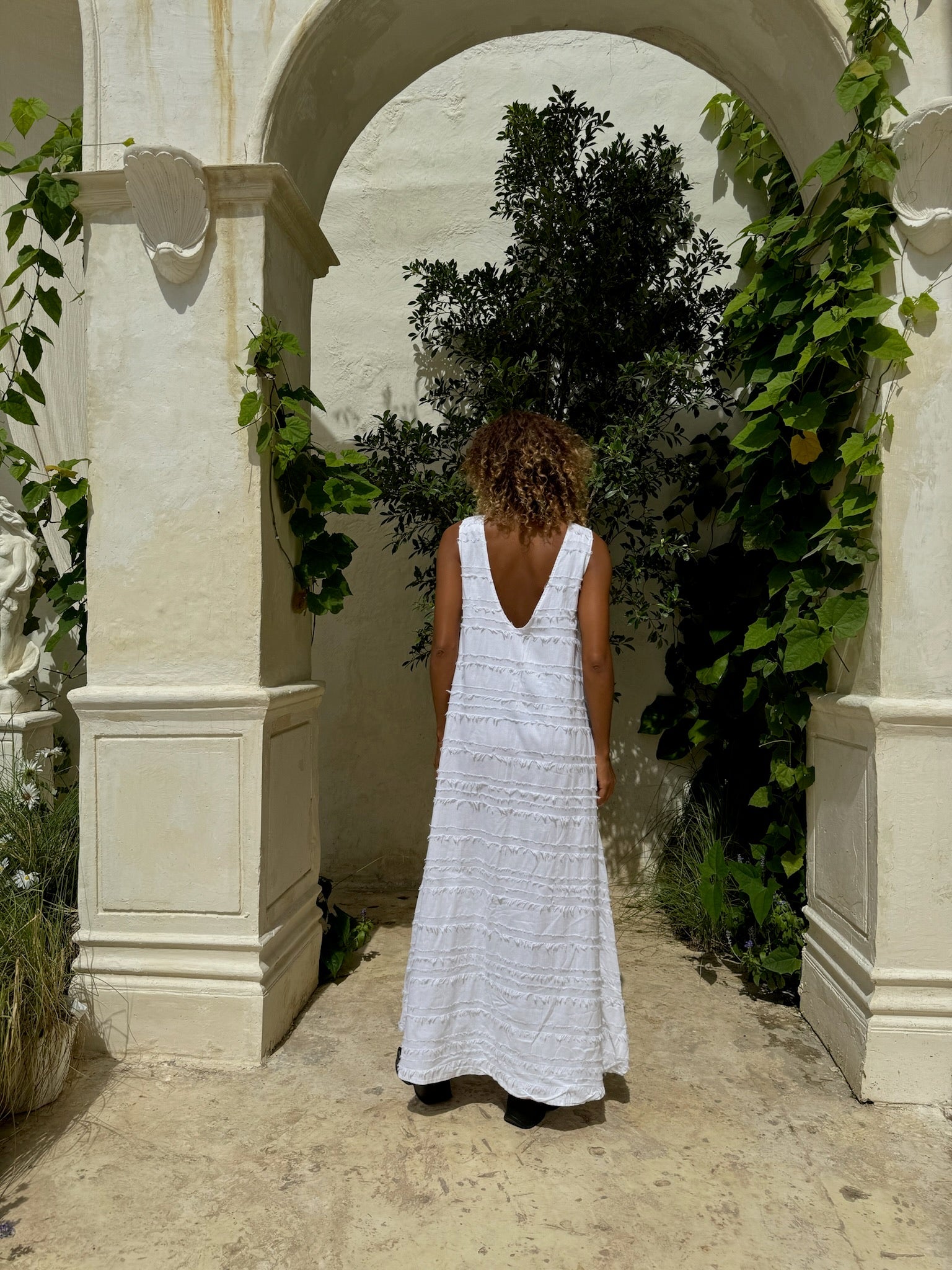 White Gili maxi dress elevated from beach to dinner — coastal chic style by Puka The Label