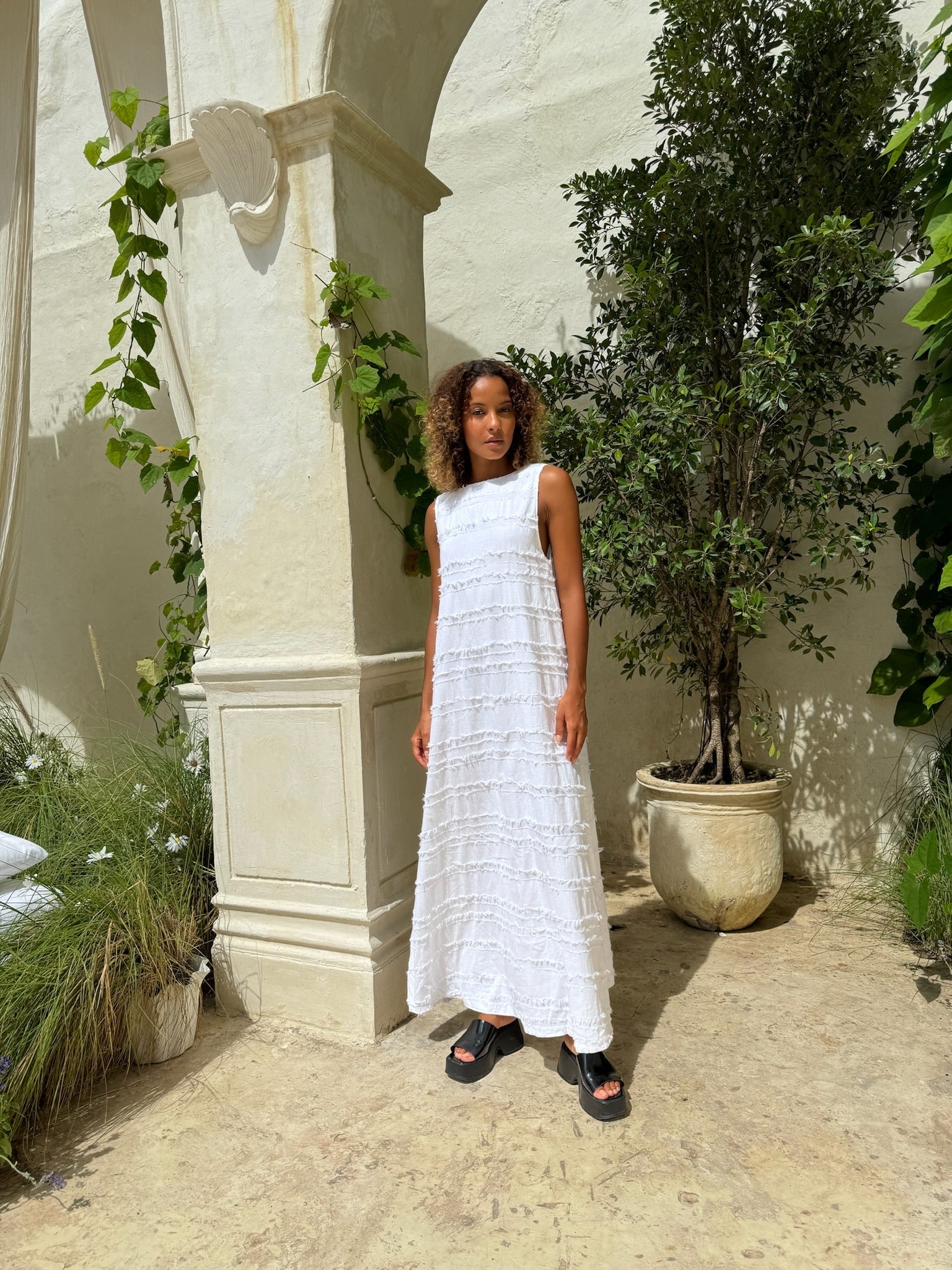 White reversible Gili maxi dress styled for coastal wedding — elegant destination outfit, Puka The Label