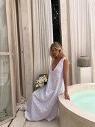 White maxi dress high neck option bump-friendly — versatile resort wear for women, Puka The Label