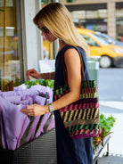 Natalie Simkins in the Camilla Dress Midnight navy maxi, floor-length silhouette, NYC florist