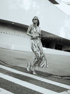 Natalie Simkins in the Puka x Natalie Simkins Cleo maxi dress in Brown Zebra print, NYC