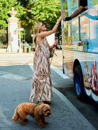 Natalie Simkins in Brown Zebra Cleo maxi dress, UES NYC street, flowing silhouette