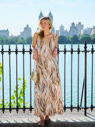 Close-up of the Cleo Brown Zebra maxi showing abstract wave print detail, NYC