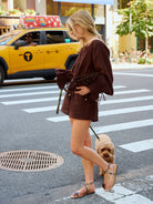 Natalie Simkins in the Colette Set Espresso, NYC street with brown studded clutch, full length