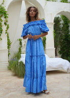 Blue tie dye formal dresses for coastal wedding guests 