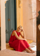 Red maxi dress pre-order spring 2026, bold feather print cotton dress for summer parties, garden events, and warm weather celebrations