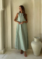Gili Stripe Maxi Dress in green, navy and white — effortless beach to dinner style with convertible neckline