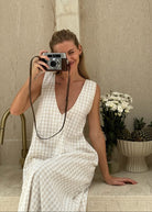 Sophisticated everyday outfit — neutral beige cotton maxi dress, effortless European summer style, Puka The Label