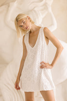 White floral eyelet cotton mini dress Palm Beach spring brunch outfit 2026, feminine reversible dress for Florida coastal occasion and garden party
