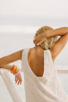 White floral eyelet mini dress garden party and country club spring outfit 2026, preppy cotton Mini Gili dress for outdoor warm weather occasion