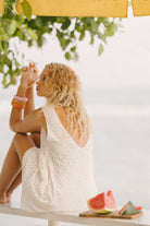 White floral eyelet cotton mini dress Cape Cod spring coastal outfit 2026, feminine reversible Mini Gili dress for New England beach town weekend