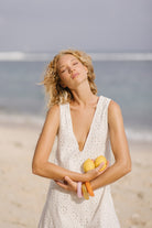 White floral eyelet cotton mini dress Newport Rhode Island spring outfit 2026, preppy reversible Mini Gili dress for East Coast coastal occasion Puka The Label