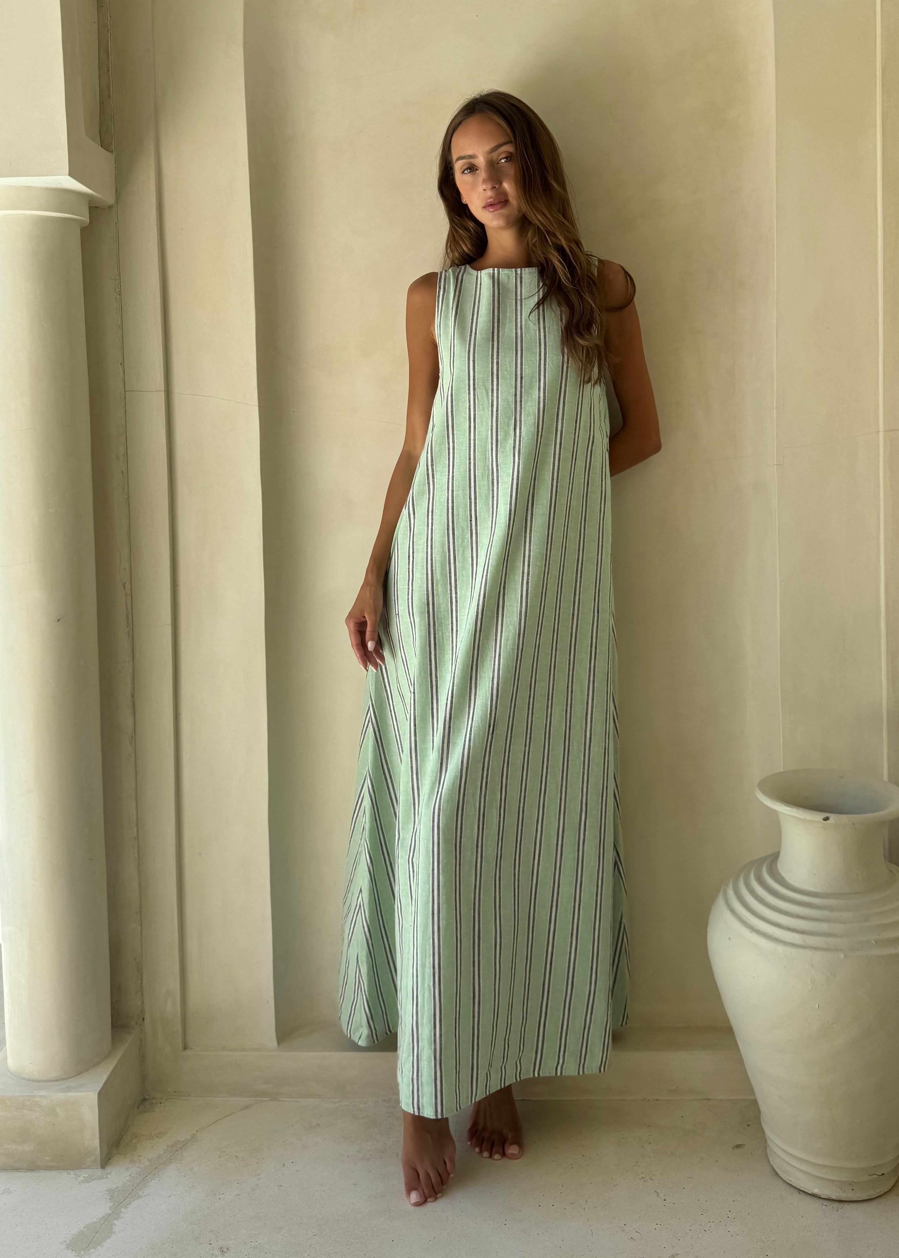 Gili Green Navy and White Stripe Maxi Dress for a French Riviera beach day, relaxed maxi silhouette for warm weather travel
