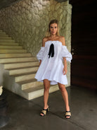 Oversized white linen dresses, preppy dresses, Nancy Meyers, how to dress coastal grandmother, how to dress coastal granddaughter, coastal vibes, summer 2022 dresses for the summer, button up cover up dresses, preppy dresses for her, off the shoulder dresses, mini dresses in white linen, off the shoulder flowy dress, cute dresses with bows, white mini beach dresses, baby shower dresses, gender reveal outfit ideas, spring 2022 outfit ideas for her, beach vacation dresses 2022