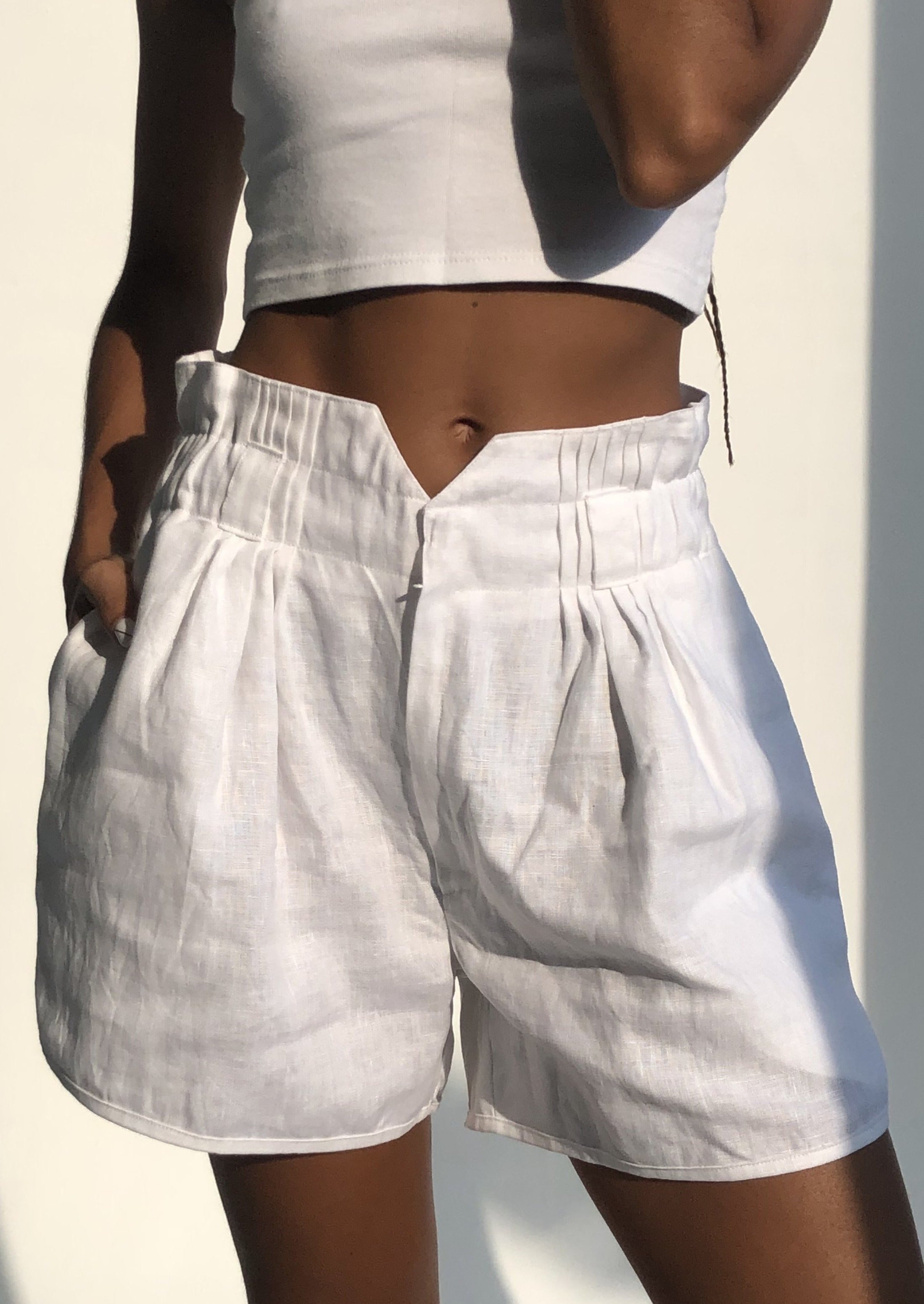 Lightweight white linen shorts for women — coastal style beach outfit, Nantucket and Hamptons inspired look