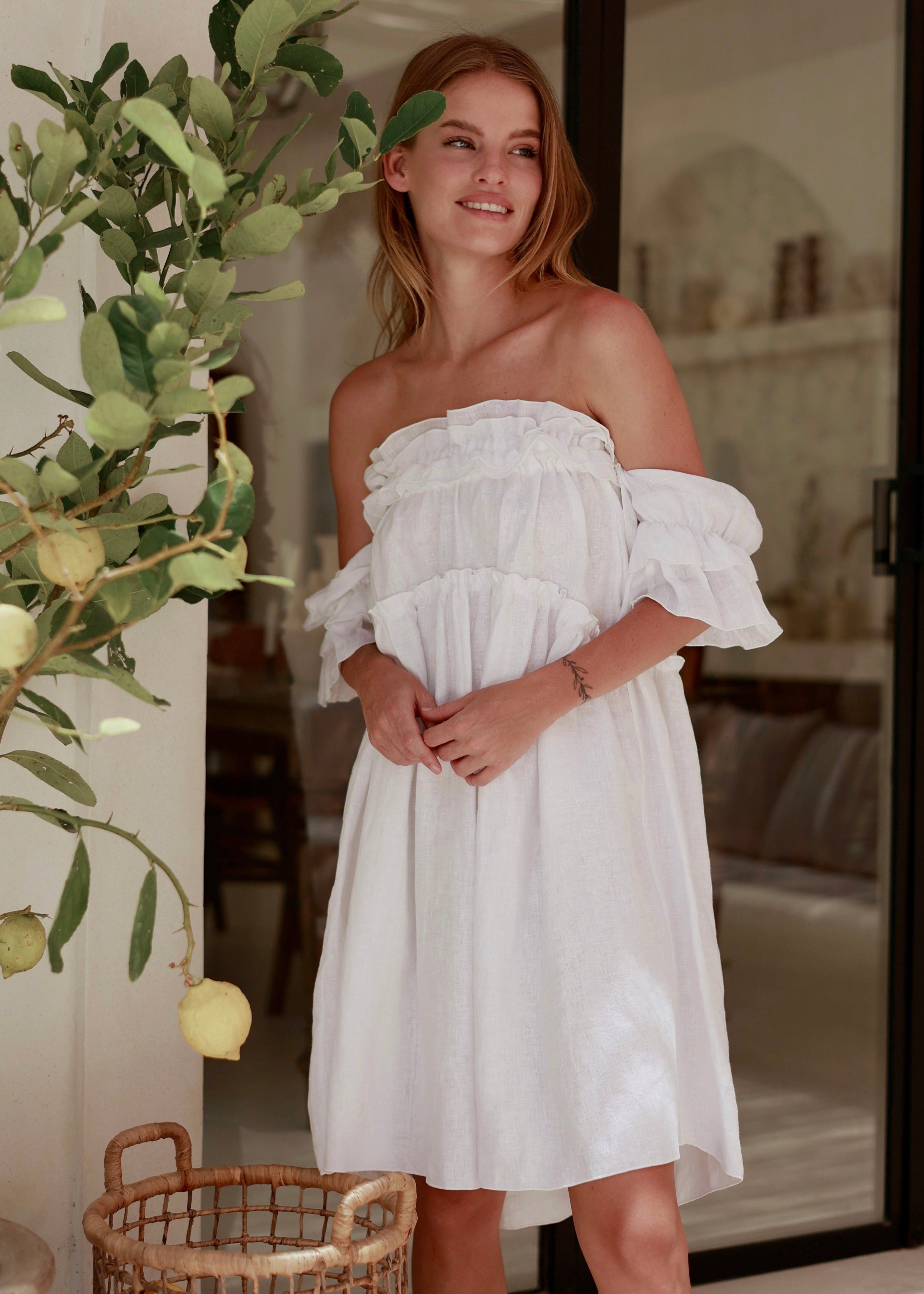 Chic, feminine off the shoulder easy to wear white dress with short sleeves, bump friendly, summer mini dress, vacation dresses