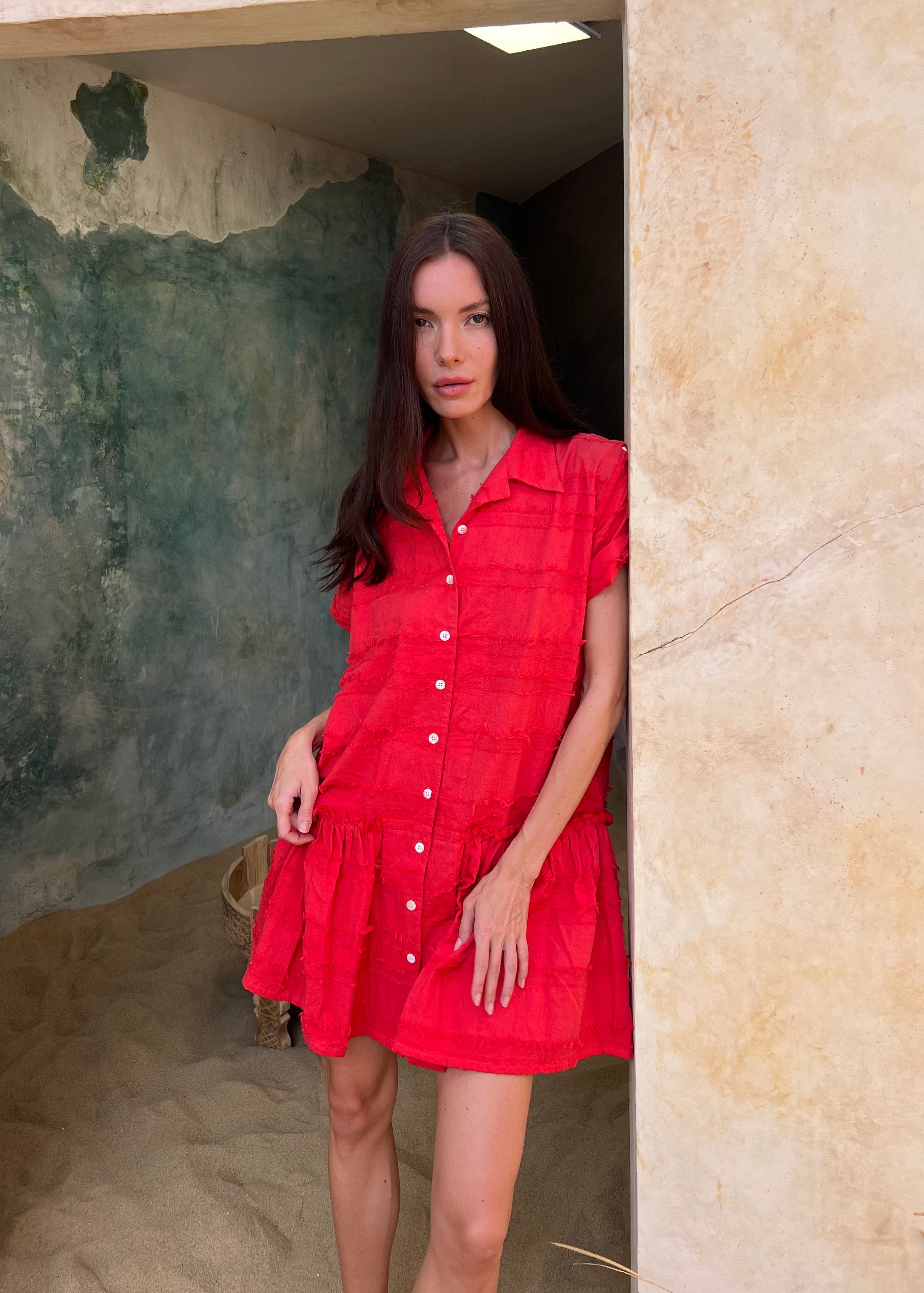 Coral textured cotton button-up mini dress beach vacation outfit summer 2026, vibrant feminine Ripley Dress for tropical travel and resort getaway