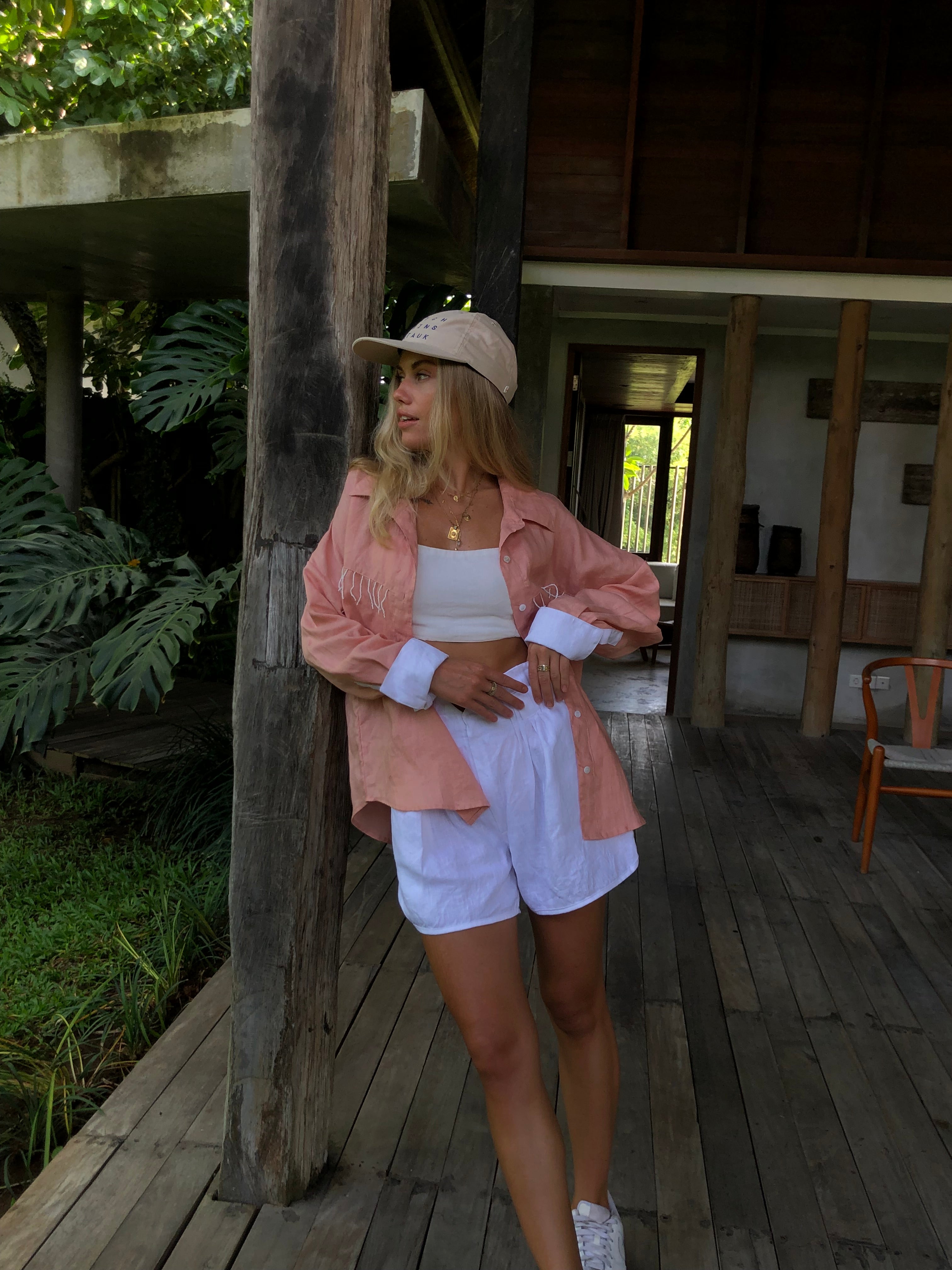 Peach Ulu fringe top styled as a fall outfit by Puka The Label — warm tones, white fringe detail, elevated Texas ranch aesthetic