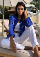 Puka white linen pants outfit — Pantai Pant in White styled as a complete easy beach look for women