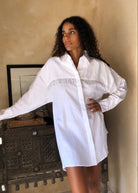 White linen hand-beaded fringe dress Hamptons preppy summer outfit 2026, cool artisan linen button-up dress for East Coast summer and coastal getaway