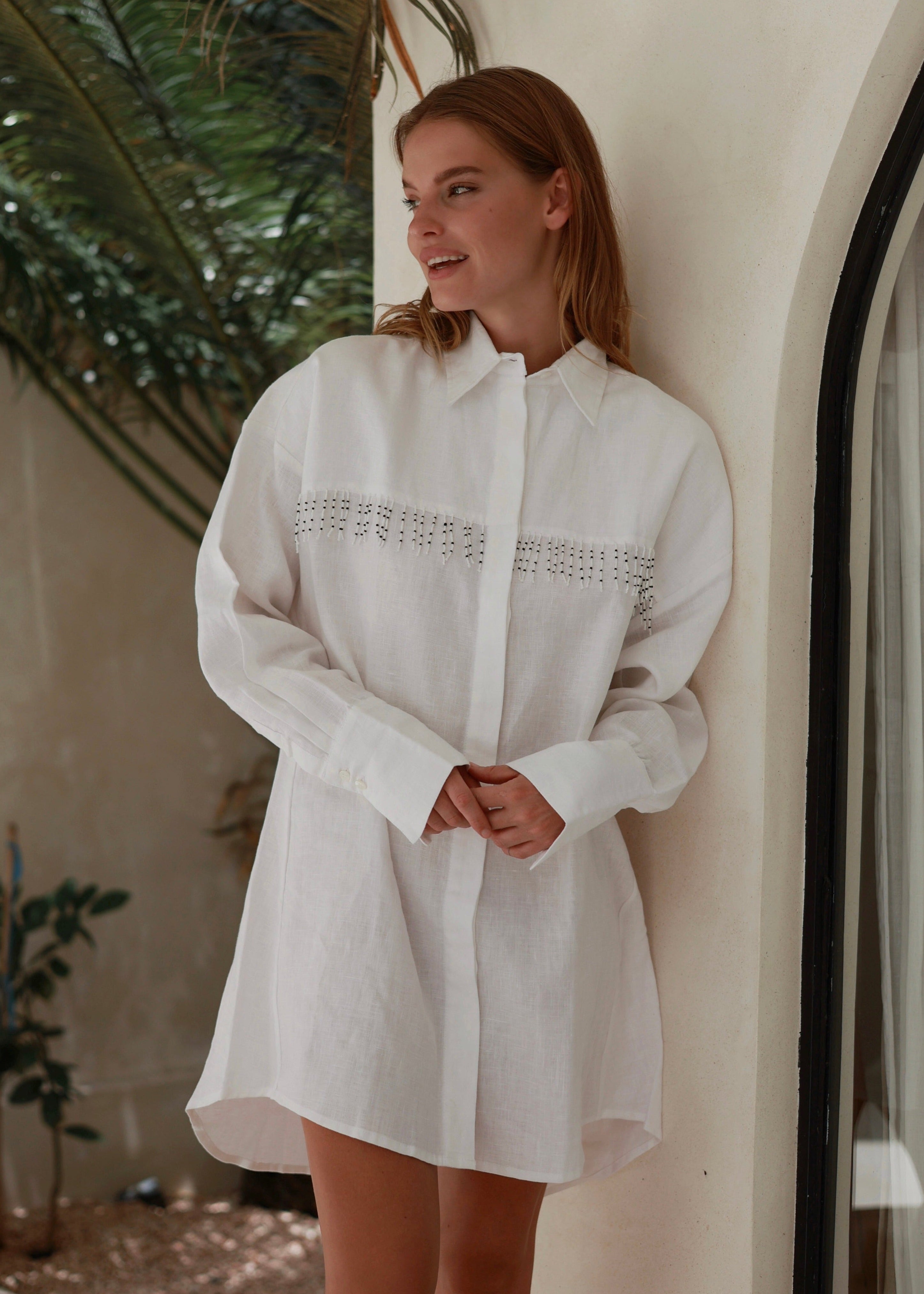 hite linen fringe button-up dress Texas ranch weekend and Hill Country summer outfit 2026, unique artisan linen dress for warm weather getaway