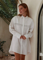 hite linen fringe button-up dress Texas ranch weekend and Hill Country summer outfit 2026, unique artisan linen dress for warm weather getaway