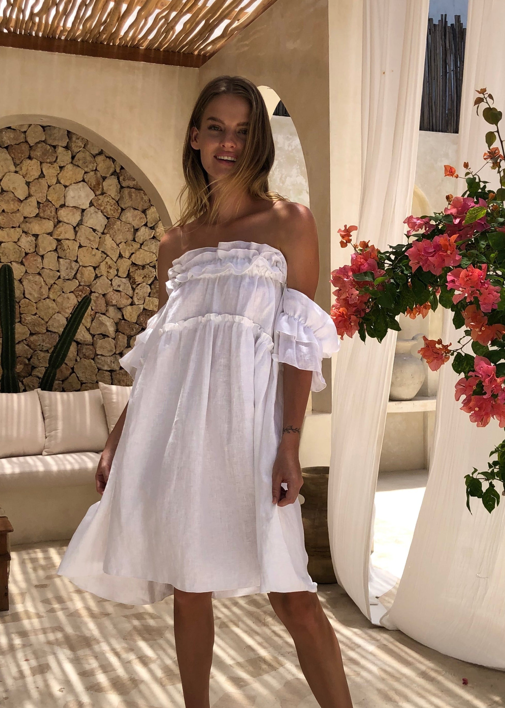 White ruffle mini dress in linen — off-shoulder women's dress perfect for beach wedding guest outfits and bridal shower attire